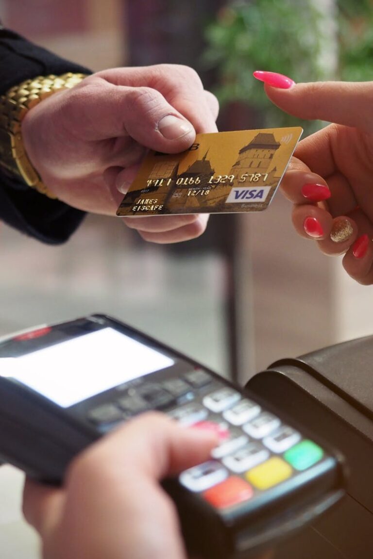 Close-up of a credit card payment being processed at a POS terminal.
